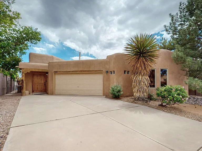 10540 Portofino Dr NW — Photo 1