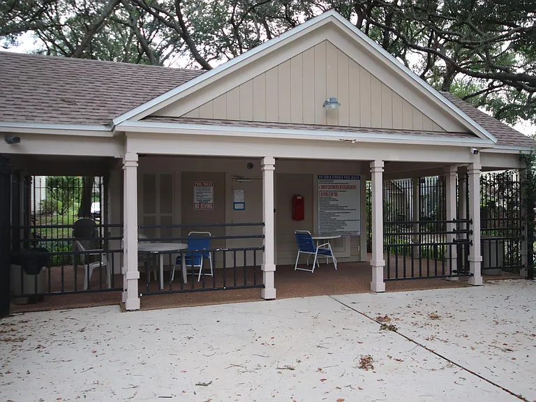 Community Pool Clubhouse with men's & women's bathrooms.