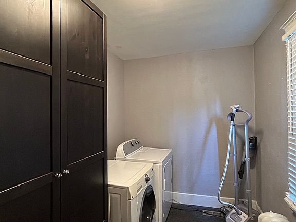 walk-in closet with washer/dryer (more closet storage added)