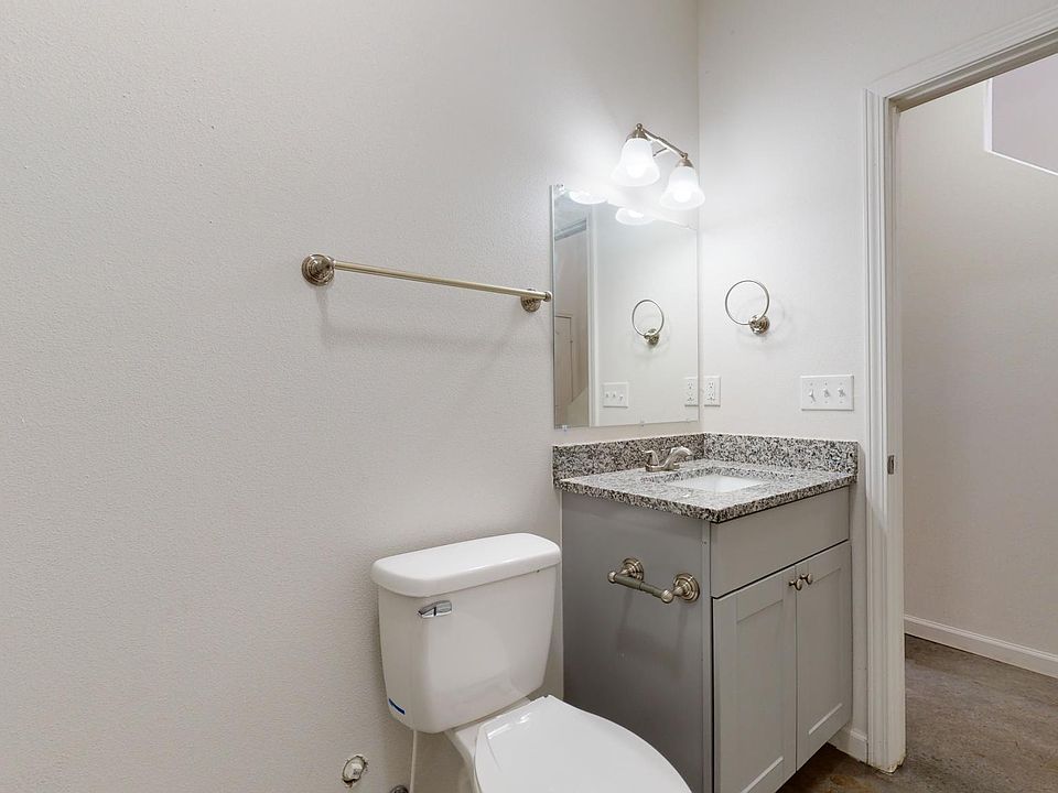 granite and countertops and sealed concrete floors