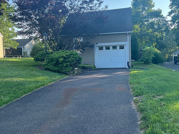 Private driveway with attached garage