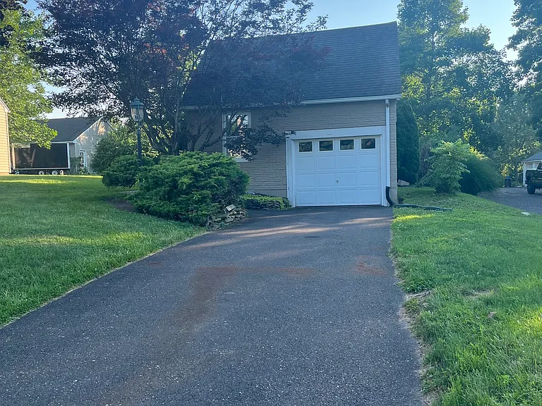Private driveway with attached garage