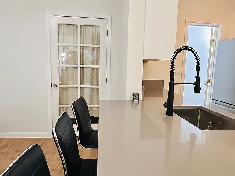 Bar stools to entertain with open concept kitchen.