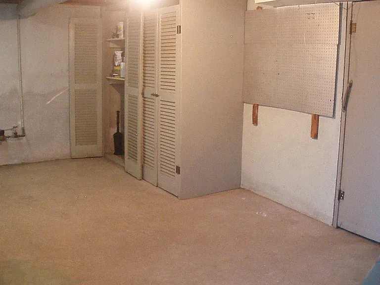 front of basement with locker closets for storage