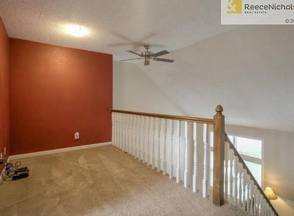 Beautiful balcony overlooks the living room below.