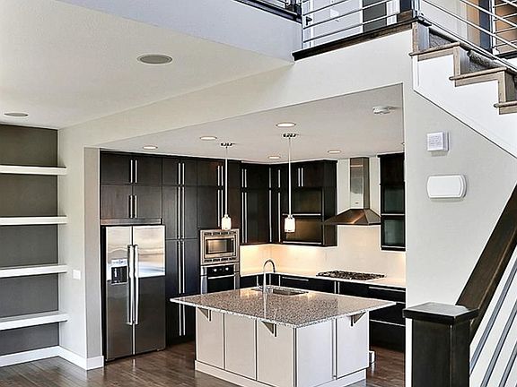 4th image of 8591 E 33rd Ave
