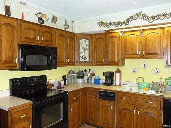 Built in trash compactor, smooth surface electric range