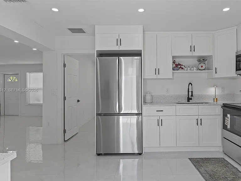 1473 NE 30th Ct — Photo 15