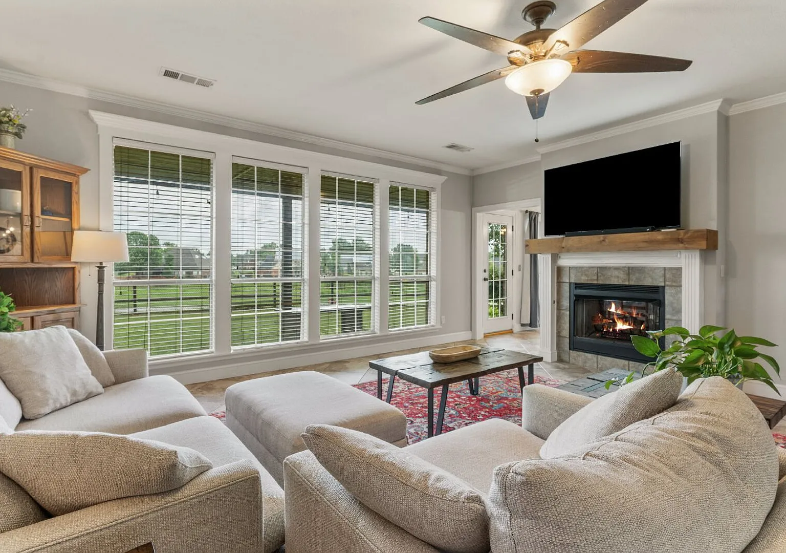 4 Beds | 2.5 Baths | Golf Course Views + 3-Car Garage in Quiet Owasso Cul-de-Sac — Photo 2