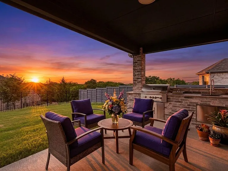 Outdoor kitchen for the best backyard entertaining and grilling. The furniture is virtually staged.