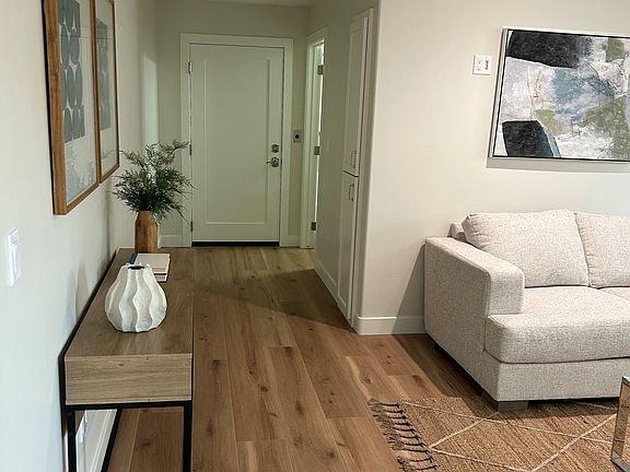 Hallway leads to the bathroom. The door at the end of the hall is an elevator to the top floor of the main home, but is locked on this level.