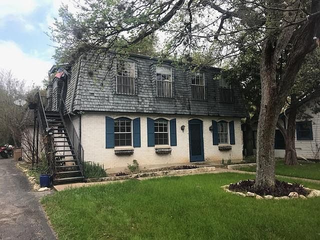 Outside view of the duplex. The downstairs unit is for rent.