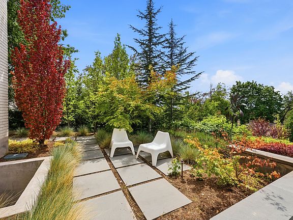 Enjoy mornings on your private front patio with city views.