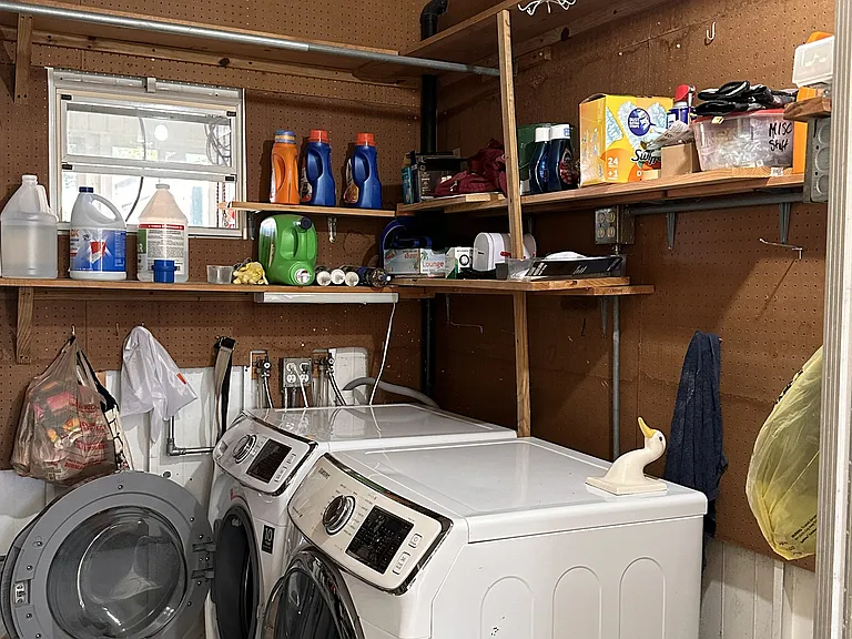 Laundry/Utility Room in enclosed porch