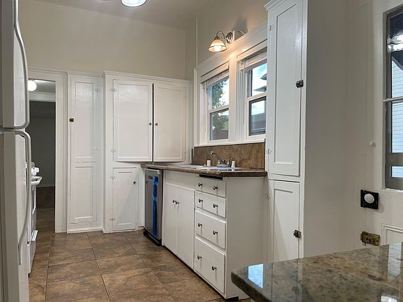 Original cabinets, but make it functional with a new dishwasher :)