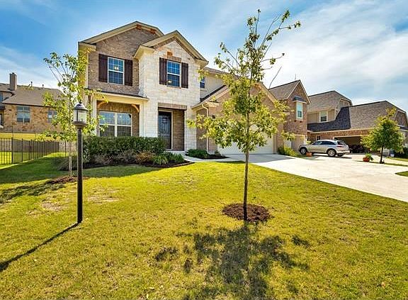 Stone exterior with wood accents.