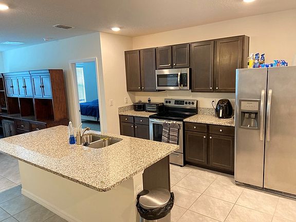 2nd image of 5622 Breezy Palm Pl