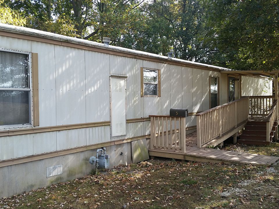 Front with porch and ramp