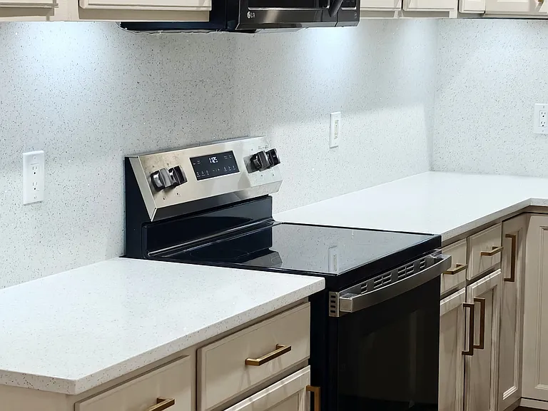 Glass top cooking range and oven