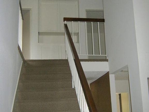 Staircase looking upwards to second floor