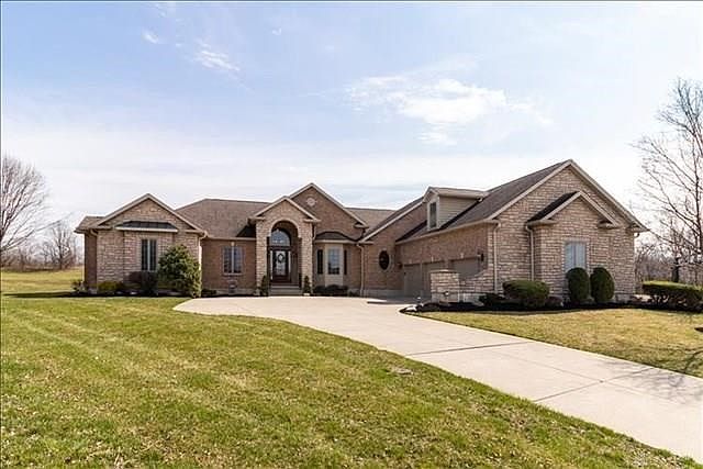 Beautiful custom home, immaculately maintained. Three-car over-sized garage. Double-wide concrete driveway.