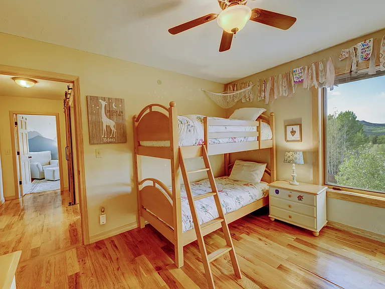 Bunk bed is no longer in this bedroom. It was replaced by a queen bed, but we can also put in a king or twin.