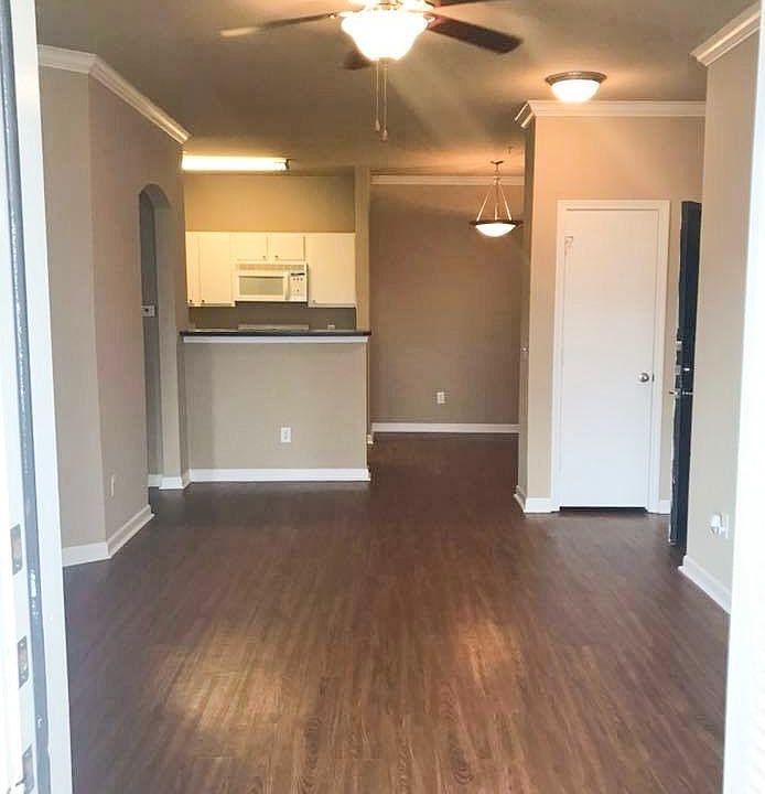 The Franklin features wood floors, vaulted ceilings, and gorgeous fixtures.