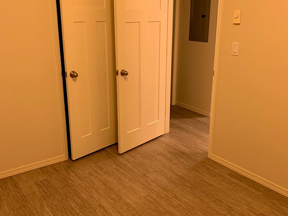 Bedroom. Entire house has this same flooring.