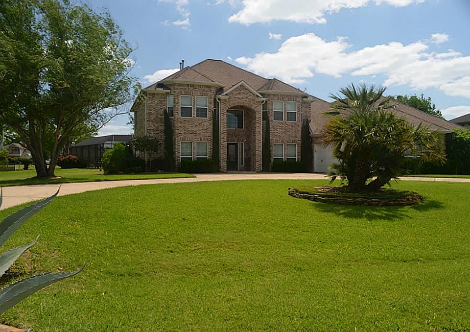   This incredible home is all brick, full gutters and a circle drive.