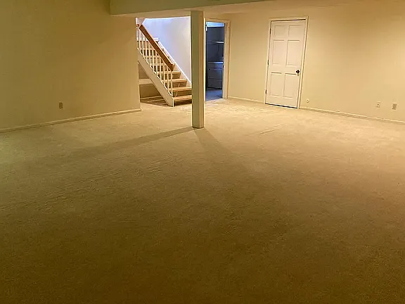 Huge finished lower level offering flexible space for a recreation room, fitness area, media room, or home office.