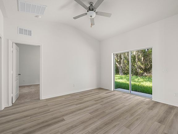 The family opens up to the backyard with sliding doors