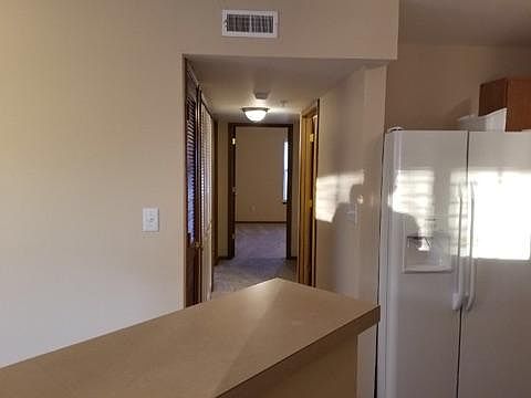 Looking down the hallway to the master bedroom, guest bedroo
