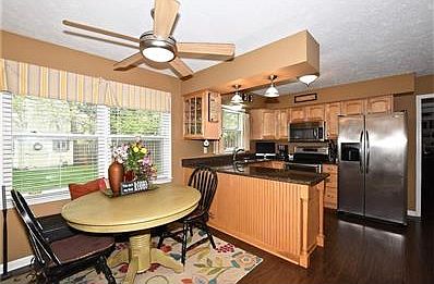 Super cute, updated kitchen with hardwood floors, cozy breakfast nook and tons of natural sunlight!