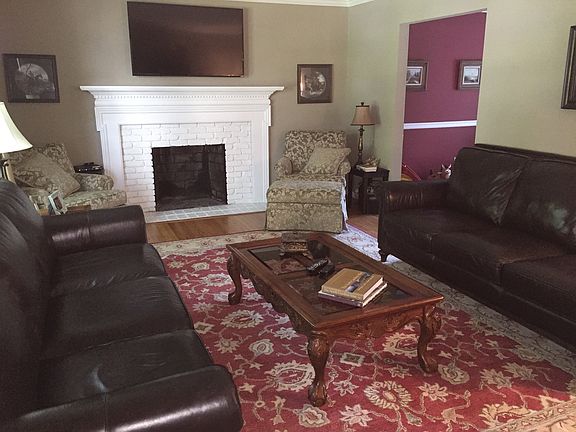 Large den with fireplace