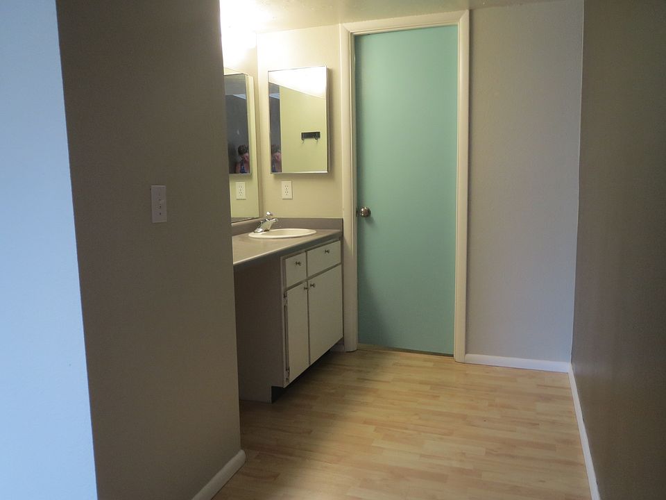 Master Bedroom exterior bathroom with large mirror; in-betwe