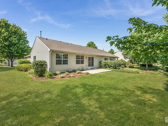 Lots of established landscaping in both the front and back yards.