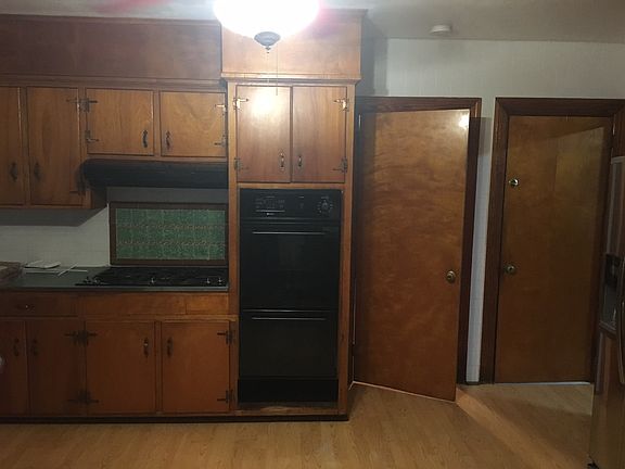 Large kitchen. Stainless Refrigerator and dishwasher.