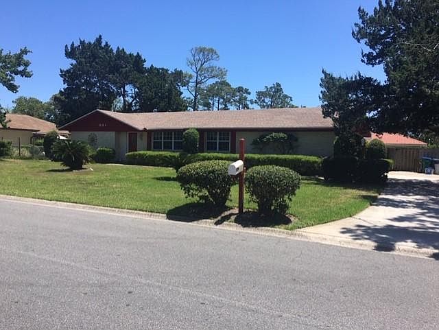 Front of home; Hidden Garage on right