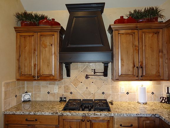 Pot-filler and gas stovetop