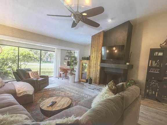 Family Room with wood burning fireplace.