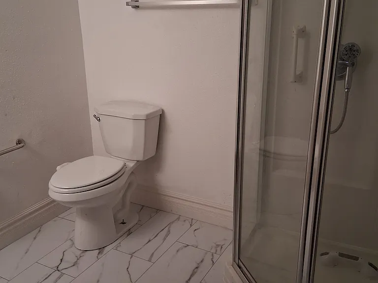 Shared newly renovated basement bathroom for Rooms D, E, F