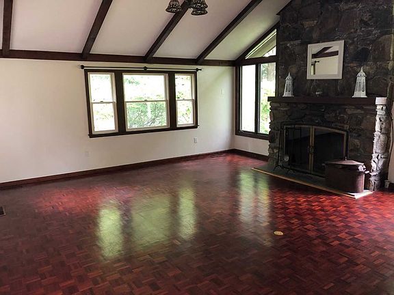 LR has original HW Floors, beams & floor outlets