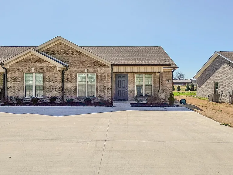 23418 Nick Davis Rd — Photo 1