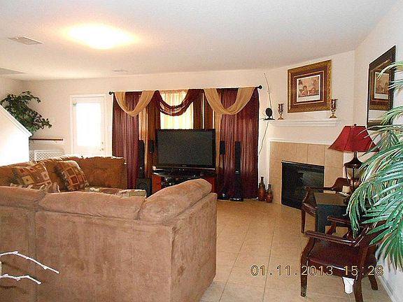 Come and enjoy this lovely gas fireplace. Living room is very large.