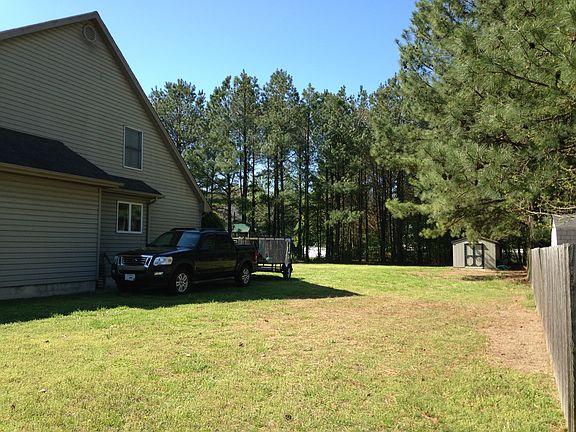 Side yard view to shed