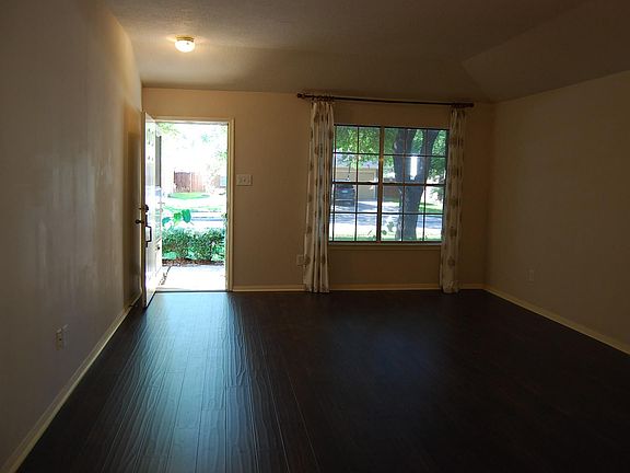 Beautiful and durable handscraped flooring throughout main areas of home