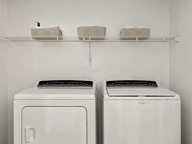 Simplify your routine with a washer and dryer inside your home.