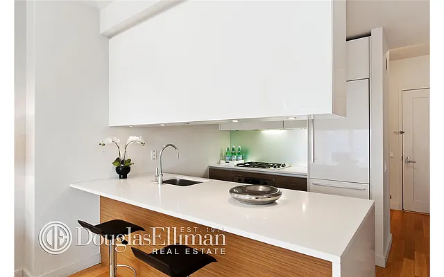 Sold by Douglas Elliman | media 11