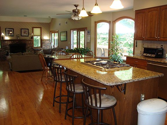Open Kitchen with granite counters and stainless appliances