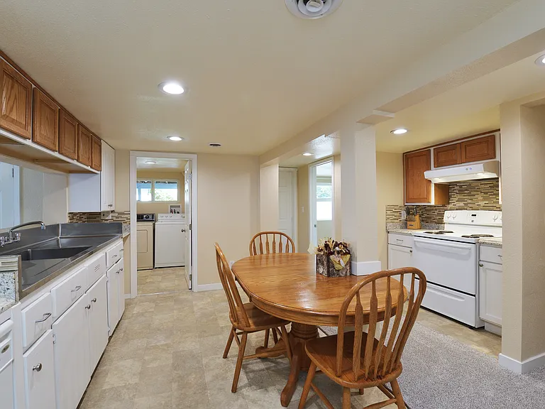 Downstairs - Second Kitchen w/ Dining Table & Second Utility